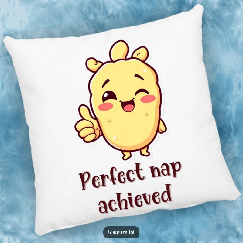 Funny tempura character winking and giving a thumbs up on a soft, decorative pillow, symbolizing comfort and approval.