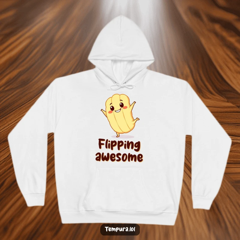 Funny Kawaii tempura character with a big grin, doing a cartwheel on a hoodie, ready for cozy fun.