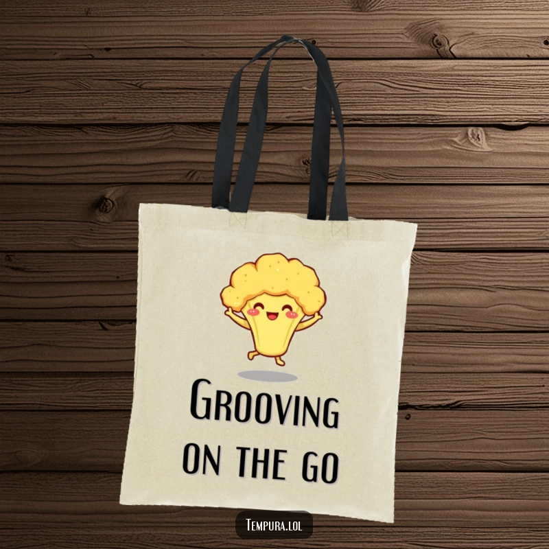 Funny tote bag with a smiling tempura broccoli character dancing enthusiastically on little legs, perfect for errands and smiles.